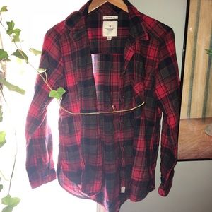 red, gray, and navy blue american eagle flannel